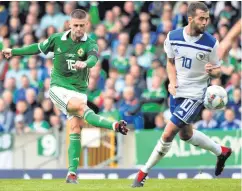  ?? INPHO ?? On target: NI ace Oliver Norwood fires in a shot against Bosnia-Herzegovin­a at Windsor Park last month