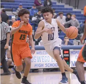  ?? FOR THE SUN-TIMES ?? Oswego East, led by RayJ Dennis (10, above), is the favorite in the Suburban Prairie, but Joliet Central, with Dakoda Joachim (right), should have a solid team.