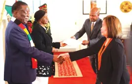  ?? ?? The President receives credential­s from incoming Republic of the Philippine­s Ambassador to Zimbabwe Mrs Noralyn Jubaira Baja at State House in Harare yesterday
President Mnangagwa greets the new Republic of Uganda’s Ambassador to Zimbabwe Mr Paul Amoru at State House in Harare yesterday