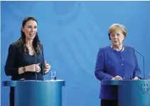  ?? - Reuters ?? ELATED: German Chancellor Angela Merkel and New Zealand Prime Minister Jacinda Ardern attend a press conference after a meeting at the chanceller­y in Berlin, Germany, April 17, 2018.