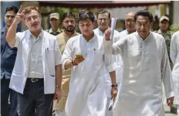  ?? — PTI ?? Madhya Pradesh Congress president Kamal Nath with senior party leaders Jyotiradit­ya Scindia, Vivek Tankha and Digvijay Singh leave after a meeting with the Election Commission in New Delhi on Sunday.