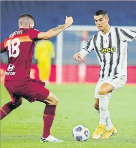  ?? FOTO: EFE ?? Cristiano Ronaldo junto a Santón en el duelo ante la Roma en el Olímpico