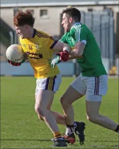  ??  ?? James Stafford tries to shake off James Dolan from Westmeath.