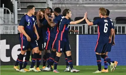  ??  ?? Chris Mueller (11) is congratula­ted by teammates after one of his two goals. Photograph: Jasen Vinlove/USA Today Sports