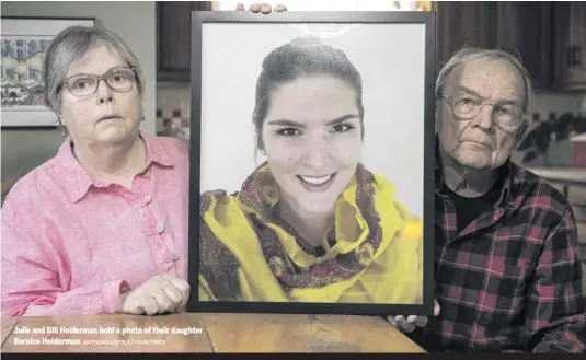  ?? ANTHONY VAZQUEZ/ SUN- TIMES ?? Julie and Bill Heiderman hold a photo of their daughter Bernice Heiderman.