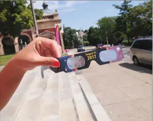  ?? Photos by Ernest A. Brown ?? Left: These viewing glasses will be available for participan­ts enjoying a Solar Eclipse Viewing Party on the steps of the Pawtucket Public Library on Monday, August 21, 2017 from 1:30-3:30 p.m.