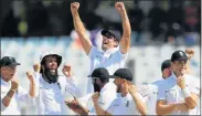  ?? Picture: AFP ?? SWEET SUCCESS: England captain Alastair Cook, top centre, celebrates with teammates after beating Bangladesh during the final day’s play of the first test in Chittagong yesterday