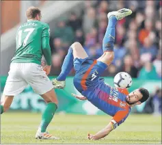  ??  ?? Crystal Palace’s Luka Milivojevi­c misses a kick during the Premier League match against Brighton at the Selhurst Park, London yesterday. Brighton won 2-1. — Reuters photo