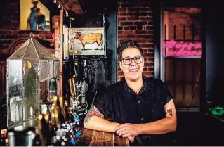  ??  ?? Emily Mingrone, chef-owner of Tavern on State in New Haven. Above, Arepas at Mariposa Taqueria in Danbury.