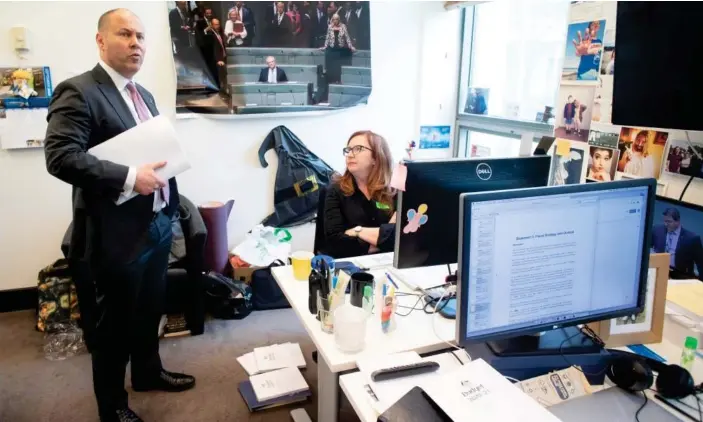  ?? Photograph: Mike Bowers/The Guardian ?? Treasurer Josh Frydenberg talks to Guardian political editor Katharine Murphy in the Canberra press gallery on Tuesday before announcing his 2020 budget.