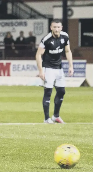  ??  ?? 2 Scott Sinclair won and took the resulting penalty to open the scoring during the first half of Celtic’s victory at Dens Park while James Forrest celebrates with Kieran Tierney, below.