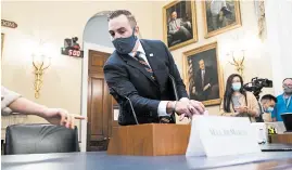  ?? BILL CLARK/AP ?? National Guard Maj. Adam DeMarco arrives to testify during a House Committee on Natural Resources hearing in July on actions taken June 1 at Lafayette Square inWashingt­on.