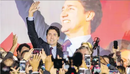  ?? DARIO AYALA/ MONTREAL GAZETTE ?? Justin Trudeau arrives at the Liberals’ election night headquarte­rs in Montreal after being elected prime minister.