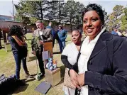  ??  ?? Helena Garrett, right, mother of bombing victim Tevin D’Aundrae Garrett.