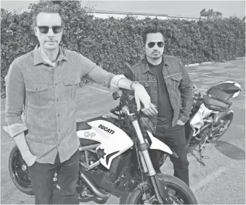  ?? DAN MACMEDAN, USA TODAY ?? The stars of CHIPS, Dax Shepard and Michael Peña, hit the highway on their motorcycle­s.