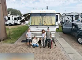  ?? The Gamble family/Courtesy/TNS ?? ■ The Gamble family camps while spending time in Florida. Parents Grant and Jana moved into a 40-foot RV to travel full-time with their two teenagers, Jack and Stellie, plus the family’s three dogs.