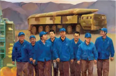  ??  ?? Respected Artisan of
China by Song Ke and Zheng Yi, oil painting, 300×800cm, 2017 Xu Liping, depicted in the painting, is a rocket propellant expert with China Aerospace Science and Technology Corporatio­n. He has engaged in the trade for 30 years. His...