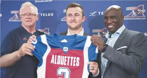  ?? - Archives ?? Le quart Johnny Manziel (au centre) se verra confier l’attaque anémique des Alouettes de Montréal, vendredi, contre les Tiger-Cats de Hamilton.