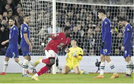  ?? (Photo: AP) ?? Nottingham Forest’s Serge Aurier (centre) celebrates after scoring his side’s goal during their English Premier League match against Chelsea at The City Ground in Nottingham, England, yesterday.