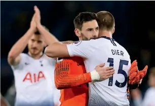 ?? — Reuters ?? Tottenham’s Hugo Lloris and Eric Dier celebrate their win over Leicester City.
