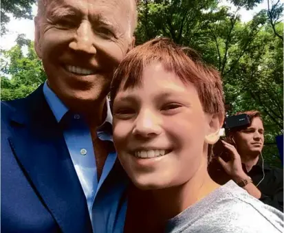  ?? QUINN MITCHELL ?? Quinn Mitchell got a photo with President Biden. In June 2019, he questioned Biden at a campaign event, and a clip wound up on Fox News.
