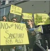  ?? Haven Daley Associated Press ?? PROTESTERS of President Trump’s executive order targeting so-called sanctuary cities gather outside a courthouse in San Francisco last year.