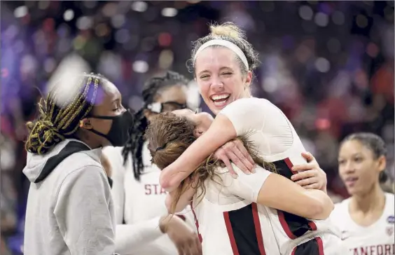  ?? Carmen Mandato / Getty Images ?? Lexie Hull of Stanford celebrates her team’s win against Arizona in the NCAA Tournament championsh­ip game at the Alamodome on Sunday in San Antonio. Hull had 10 points and 10 rebounds in 33 minutes in the final against the Wildcats, who are also in the Pac-12.