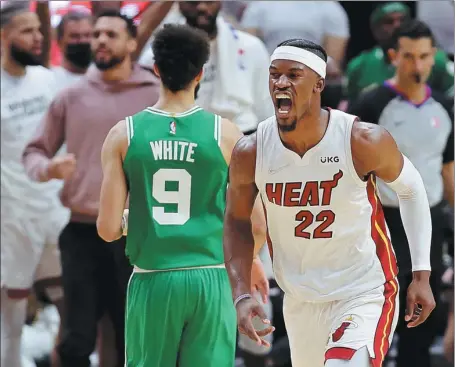  ?? AFP ?? Jimmy Butler of the Miami Heat celebrates a bucket against the Boston Celtics during Game 1 of the NBA Eastern Conference finals at FTX Arena in Miami, Florida, on Tuesday.