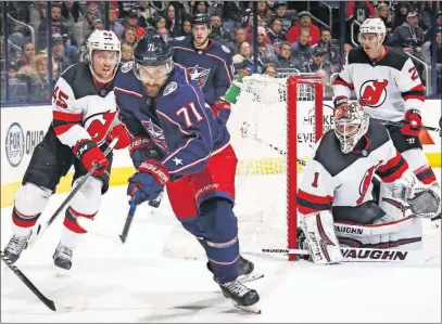  ?? [JOSHUA A. BICKEL/DISPATCH] ?? Left wing Nick Foligno, who played in his 400th game with the Blue Jackets on Saturday night, had a goal waved off before scoring in the third period of a 6-1 win over New Jersey.