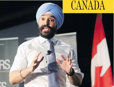  ?? FRED CHARTRAND / THE CANADIAN PRESS ?? Navdeep Bains, Minister of Innovation, Science and Economic Developmen­t announces the Innovation Superclust­ers.