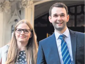  ??  ?? Ashers Bakery owners Amy and Daniel McArthur celebrate outside the Supreme Court