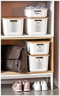  ?? ?? These white plastic storage baskets with a stylish Scandi-inspired bamboo lid are ideal for stacking, and so versatile they can multitask anywhere in the home, from a utility room to the bedroom or even the garage.