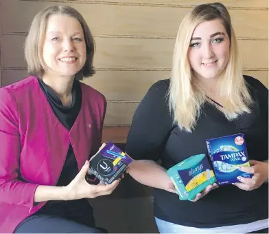  ??  ?? Mitzi Dean, parliament­ary secretary for gender equity, and Belmont secondary school student Cassidy Scott are equally excited about the B.C. government’s announceme­nt for schools to supply free menstrual products.