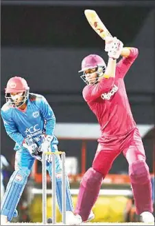  ??  ?? ON THE GO: Marlon Samuels gathers more runs through the off-side against Afghanista­n. (Photo courtesy CWI Media)