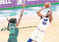  ?? USA TODAY SPORTS ?? The 76ers’ Joel Embiid, right, in action against the Celtics.