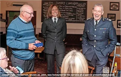  ?? ?? Joseph John Henderson, known as John, was honoured for his service at a special presentati­on event