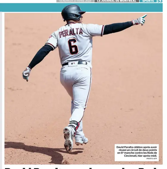  ?? PHOTO AFP ?? David Peralta célèbre après avoir réussi un circuit de deux points en 6e manche contre les Reds de Cincinnati, hier après-midi.