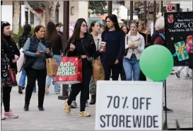  ?? ?? Black Friday shoppers visit Broadway Plaza in Walnut Creek on Friday.