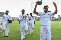  ?? AFP ?? Taijul (right) took 11 wickets to lead Bangladesh’s fightback. —