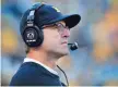  ?? RICK OSENTOSKI, USA TODAY SPORTS ?? Jim Harbaugh has guided 7-0 Michigan to the No. 2 ranking in the Amway Coaches Poll.