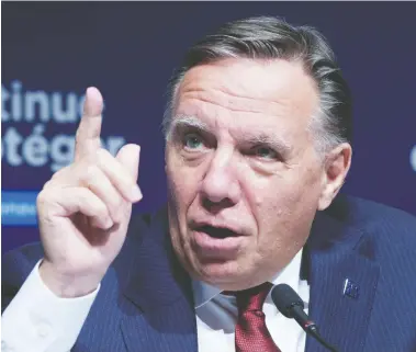  ?? PAUL CHIASSON / THE CANADIAN PRESS ?? Quebec Premier François Legault is the most popular premier in the country with a 66 per cent approval rating.