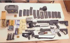  ?? WASHINGTON COUNTY SHERIFF/ASSOCIATED PRESS ?? Weapons carried by Scott Edmisten, including two submachine guns and hundreds of rounds of ammunition, are shown in Johnson City, Tenn.