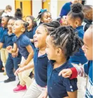  ?? CONTRIBUTE­D PHOTO BY ANGELA LEWIS FOSTER ?? Hardy Elementary students listen to Symphonic Tales during a February performanc­e at the school.