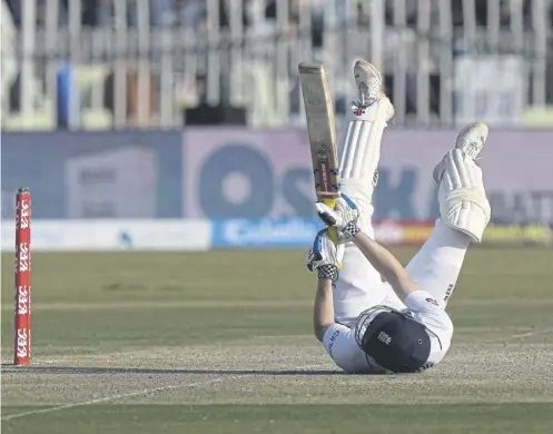  ?? ?? ↑ England’s Harry Brook loses control when playing a shot during the fourth day of the Test match between Pakistan and England