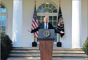  ?? EVAN VUCCI] [AP PHOTO/ ?? President Donald Trump speaks during an event in the Rose Garden at the White House to declare a national emergency in order to build a wall along the southern border on Friday in Washington.