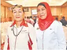  ??  ?? Ketua Kaum Long San, Lucia Paya (kiri) bersama Dato’ Rubiyah Abdul Rahman selepas majlis penutupan Program Sijil Tadbir Urus Desa INFRA-UniKL Fasa 2, Zon Sarawak, yang berlangsun­g di Miri pada 12 Oktober.