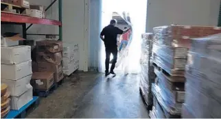  ?? JOE CAVARETTA/SUN SENTINEL ?? Justin Comparetto, is seen in the warehouse of the Just Ryt italian food importing business in Pompano Beach, Wednesday, Aug. 167, 2017.