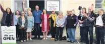  ?? PHOTO: RUBY HEYWARD ?? New and improved . . . Celebratin­g yesterday’s reopening of the Te Whare Pukapuka O Kurinui, the renamed Hampden Community Library, are the volunteers who worked tirelessly over a year to extend and refurbish the space.