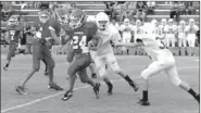  ?? MARK HUMPHREY ENTERPRISE-LEADER ?? Caleb Williams breaks through the Huntsville defense in the Cardinal seventh grade, 22-8, win Thursday. Williams scored three touchdowns, added a 2-point conversion reception and rushed for more than 270 yards in his seventhgra­de debut.