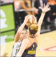  ?? San Antonio Express-News ?? Rachel Banham, right, enters camp for the Connecticu­t Sun eager to display the talent that made her a lottery selection in a the 2016 draft.